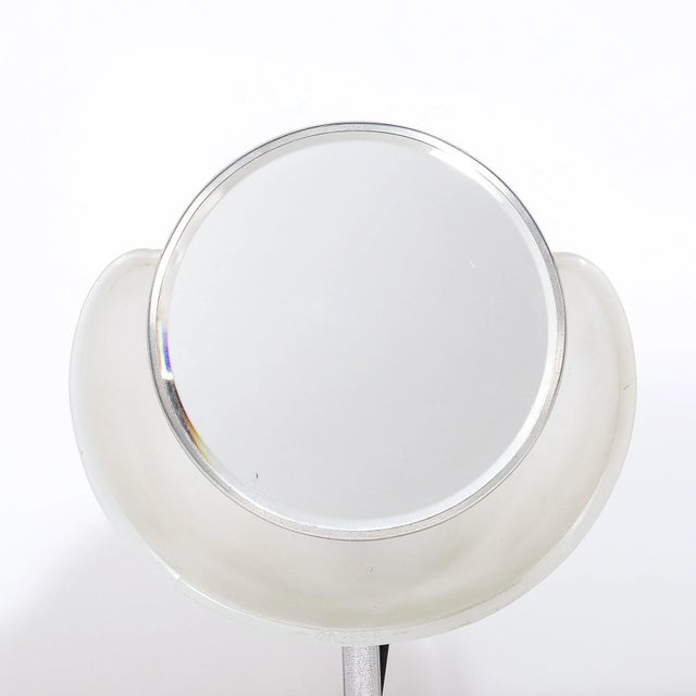 This unique and materially exquisite Art Deco Round Frosted Glass and Chrome Vanity Mirror by Lampeer Lamp Co. was created...