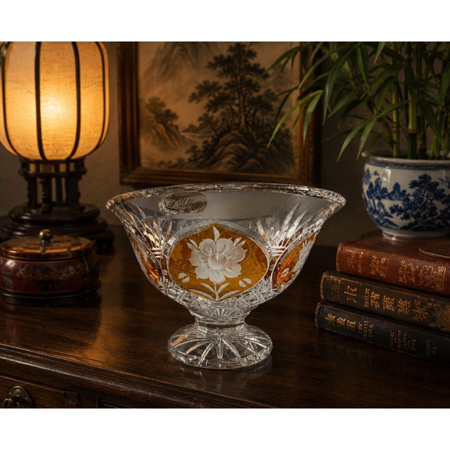 A striking vintage Julia (Poland) hand-cut lead crystal centerpiece bowl, rendered in richly saturated amber cut-to-clear...