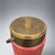 Aldo Tura Modernist ice bucket. Salmon colored parchment with brass plated details. Additional dimension of the body with...