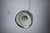 Chrome pendant lamp in the style of artemide, italy, 1970s. This striking vintage ceiling light features a rounded...