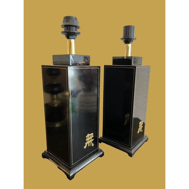 Pair of black lacquered lamps from the 70s Model Osaka, the dolphin house This piece has an attribution mark, I am sure...