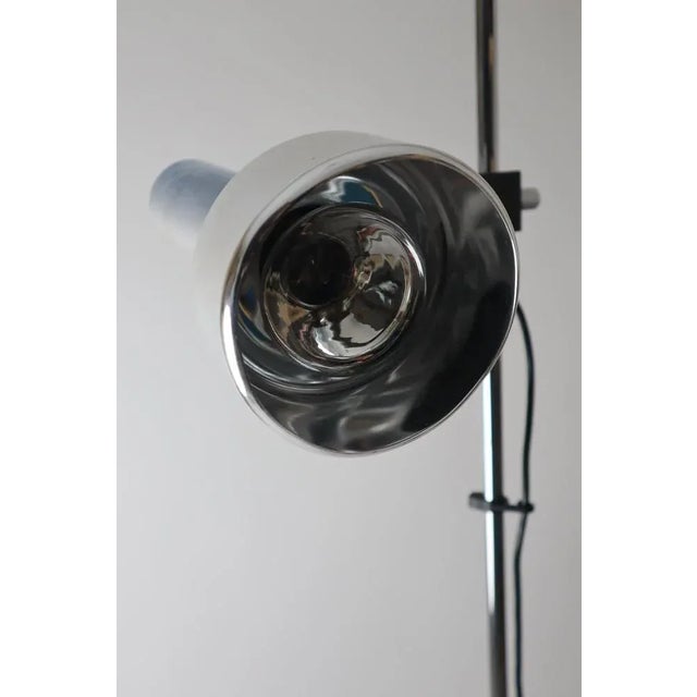 Minimalist Chrome Floor Lamp from Staff, 1970s, in Good conditions. Designed 1970 to 1979 This piece has an attribution...