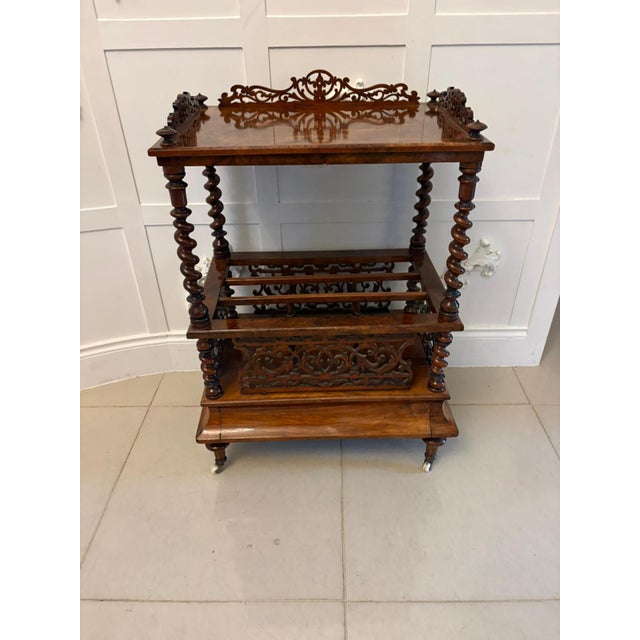 A superb quality Victorian burr walnut Canterbury of elegant proportions richly figured throughout and retaining a...