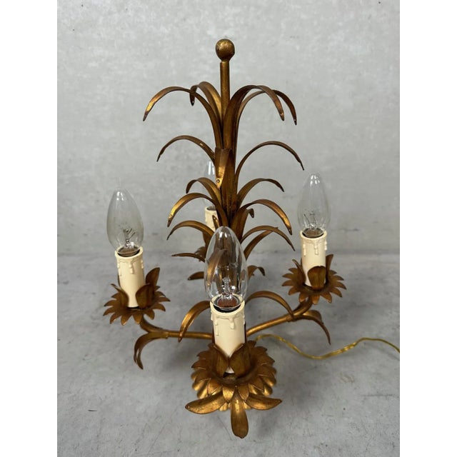 Beautiful Italian table lamp. Gold-colored fixture. Palm lamp. 4 x E14 fittings. Labeled 'Made in Italy'. Nice in a...