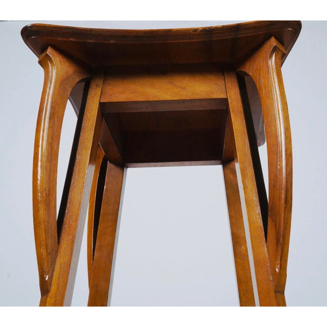 An elegant antique Art Nouveau fern stand or pedestal table dating to the early 20th century, circa 1900–1915. The tall,...