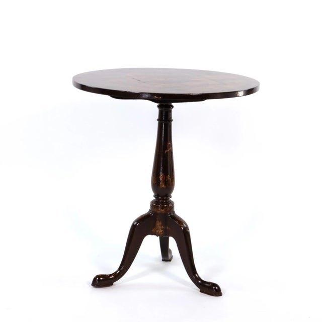 Regency period Black and Gold Chinoiserie Painted tilt-top tripod table English circa 1820 height: 28 in. 71 cm.,...
