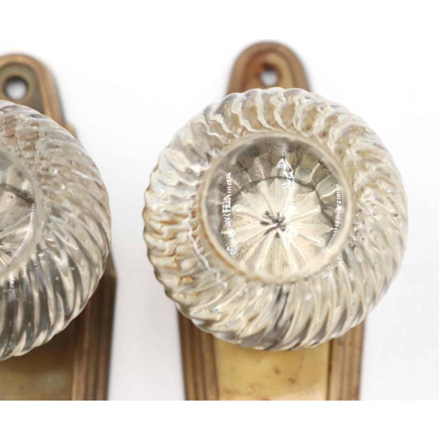 Vintage Art Deco style dummy door knobs with clear glass knobs and brass finish steel back plates. The original mounting...