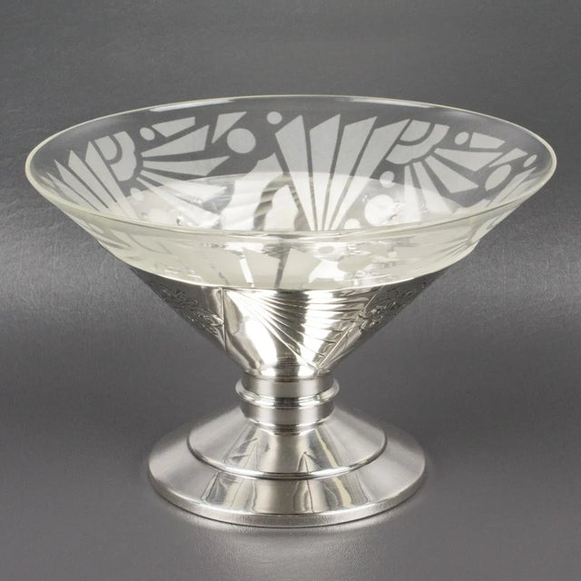The French silversmith SFAM, Paris (Société Française d'Alliages et de Métal), designed this stunning Art Deco centerpiece...