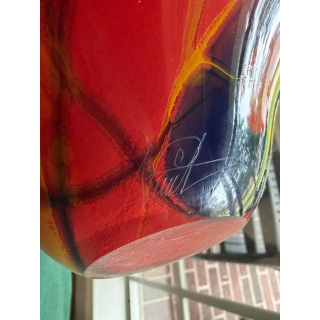 A spectacular signed hand-blown studio glass vase by internationally recognized Romanian glass artist Ioan Nemțoi (born...