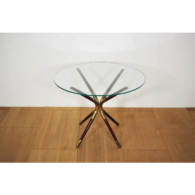 Caesar coffee table lacquer with glass top and wooden and brass base, 1958 I have official proof of authenticity such as...