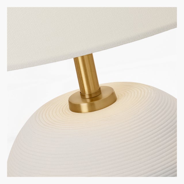 Clean lines and elemental materials lend an iconic quality to the Fanny table lamp by Hable. Available in a slim and wide...