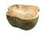 This teak live edge bowl is a unique piece showcasing the natural beauty of teak wood. Crafted by skilled artisans, its...