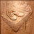 Shoes by Dana Younger | Maple and Niove Relief Sculpture of a Pair of Shoes on a Box For Sale