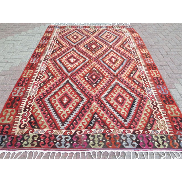 The Rug you are about to purchase is a Vintage Handmade Turkish Rug that is considered a collection piece due to its value...