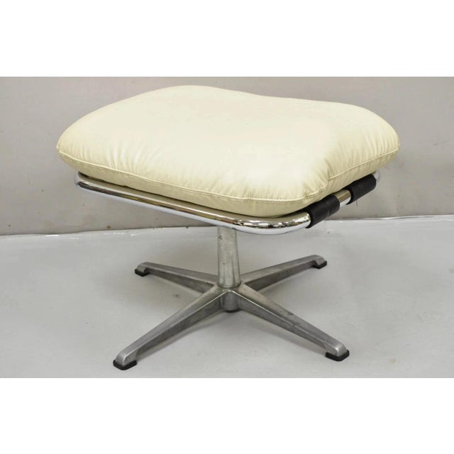Vintage Directional Mid Century Modern Tubular Aluminum Base Swivel Footstool Ottoman. Item features vinyl cushion,...
