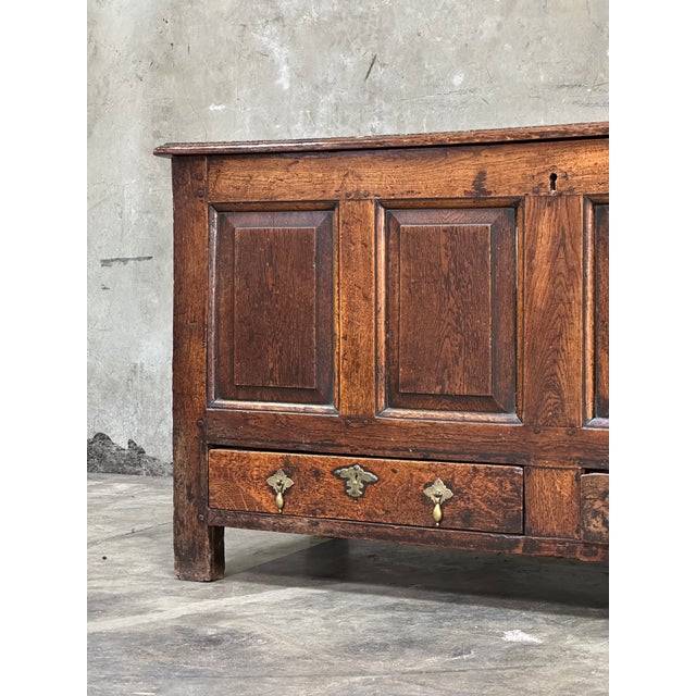 Quintessential English George III mule chest dating to the late 18th century (circa 1760–1790), crafted from solid oak and...