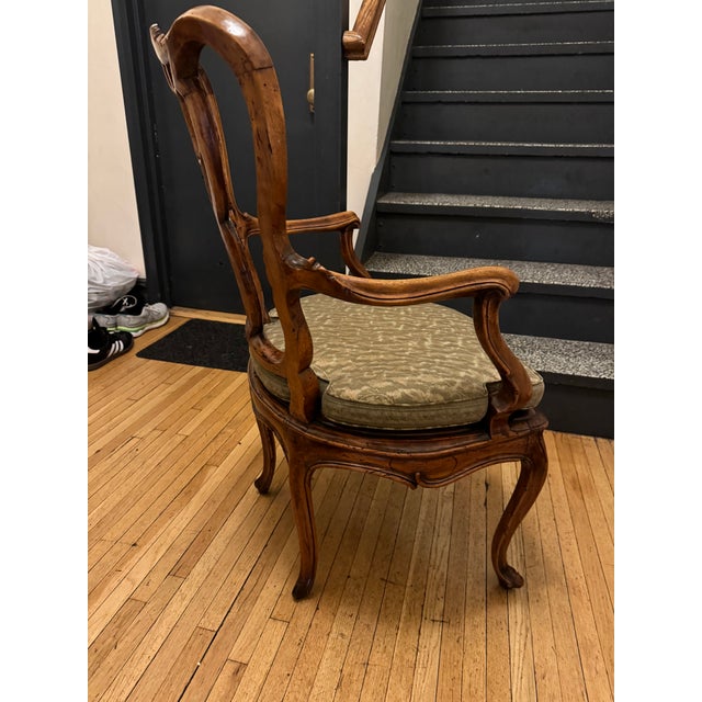 The four chairs are in a warm Italian Walnut finish that has not been over restored. The seat height is perfect for dining...