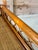 Coastal Vintage Refinished Coastal Rattan Two-Tier Bar Cart With Bottle Holders on Casters For Sale - Image 3 of 12