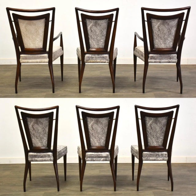 A set of six mid century modern dark framed cherry dining chairs with brass spacer accents made by John Widdicomb designed...