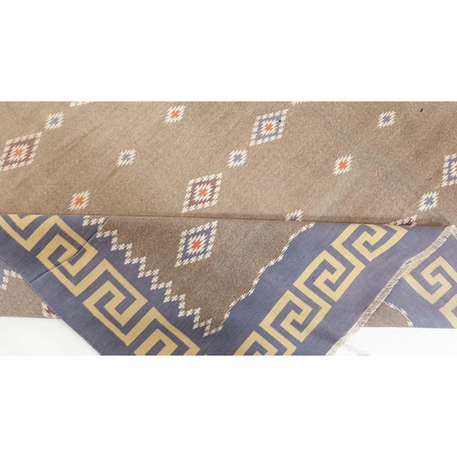 Vintage Indian Dhurrie rug Size: 10'4" × 12'6" (314 × 381 cm) This vintage Indian Dhurrie rug, measuring 19' x 10',...