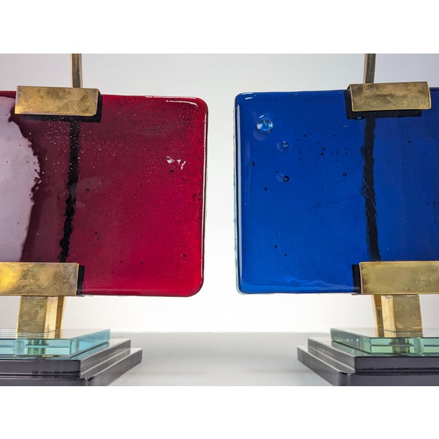 Incredible pair of table lamps made in brass and beautiful red and blue glass, attributed to Pietro Chiesa's designs for...