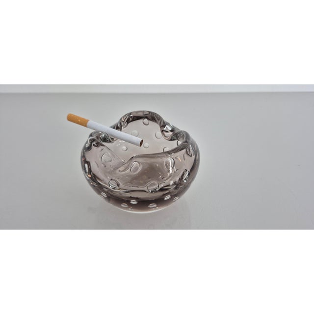 Murano glass ashtray from the 1960s. I have official proof of authenticity such as vintage catalogs, designer records, or...