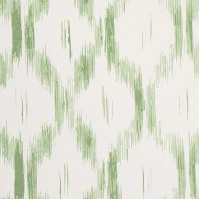 This artisanally crafted wallpaper by Mark D. Sikes puts a fresh spin on an archival ikat. Keep the borders intact or cut...