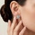 Embrace the serene beauty of spring all year round with these enchanting gemstone flower stud earrings. Expertly crafted,...