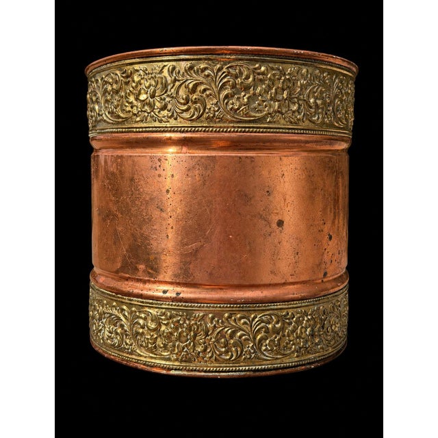 Beautiful antique copper and repoussé brass decorative wastepaper basket, dating approximately to the late 19th/early 20th...