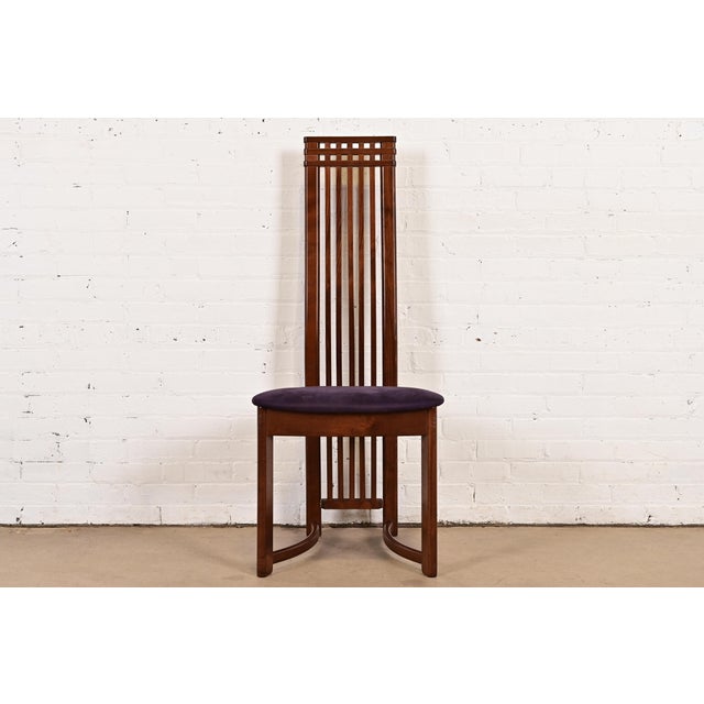 An exceptional Arts & Crafts style high back side chair or dining chair In the manner of Frank Lloyd Wright or Charles...