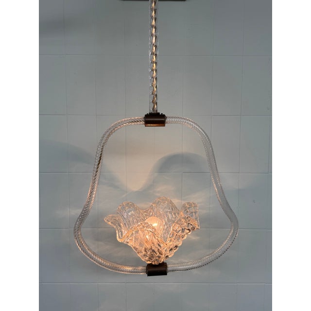 Refined Murano glass pendant chandelier, designed or attributed to Barovier & Toso. Made in Italy in the late 1950s....
