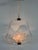 Refined Murano glass pendant chandelier, designed or attributed to Barovier & Toso. Made in Italy in the late 1950s....