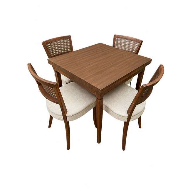 Vintage Mid-Century Modern Expandable Dining Set with Cane Back Chairs A charming vintage Mid-Century Modern dining set...