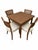 Vintage Mid-Century Modern Expandable Dining Set with Cane Back Chairs A charming vintage Mid-Century Modern dining set...