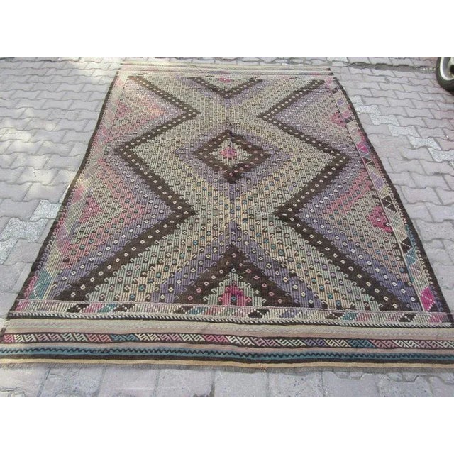 Handwoven Vintage Kilim rug from Denizli region of Turkey. Approximately 50-60 years old.In very good condition.