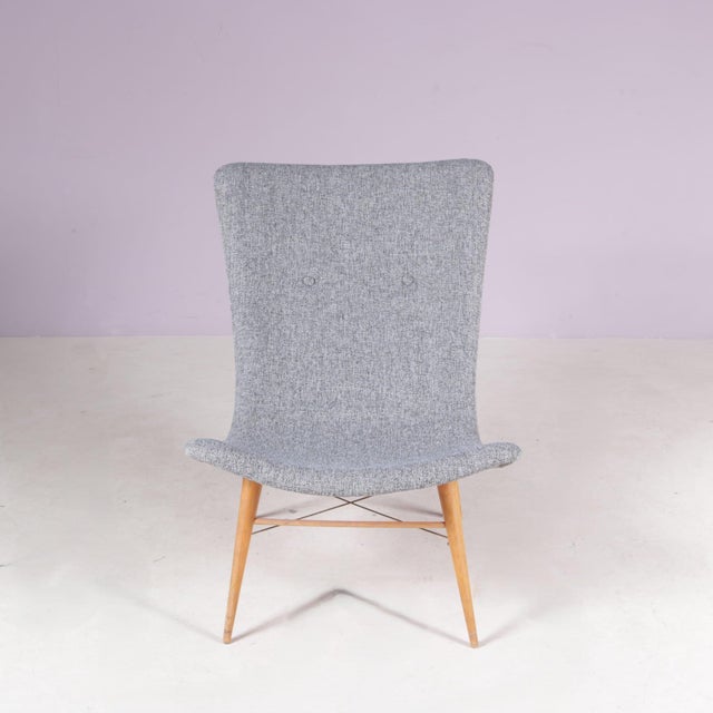Designed in 1959 by Czech designer Miroslav Navrátil, this distinctive lounge chair was produced by Český Nábytek for the...