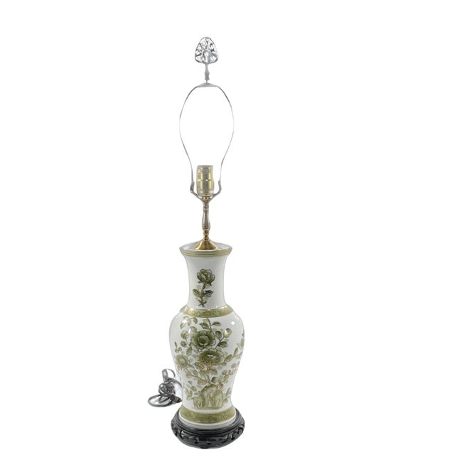 Mid Century Chinese Porcelain White & Green Vase mounted as a lamp on carved wood base. Measurements for Lamp are...