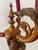 Antique Neoclassical figural candelabra table lamp, featuring a cherub or putti figurine holding a candelabra, set on a...