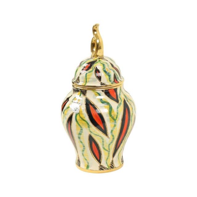 Vintage lidded vase from the Jupiter series by H. Bequet; a colorful and playful vase featuring gold details and entirely...