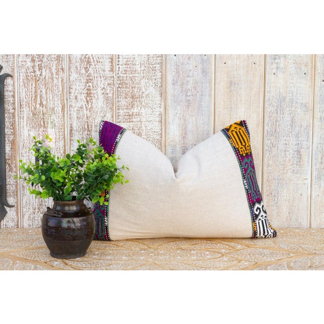 This linen pillow is flanked by rare antique tribal borders, it is bordered by hand-woven, ply-split camel girth lace and...