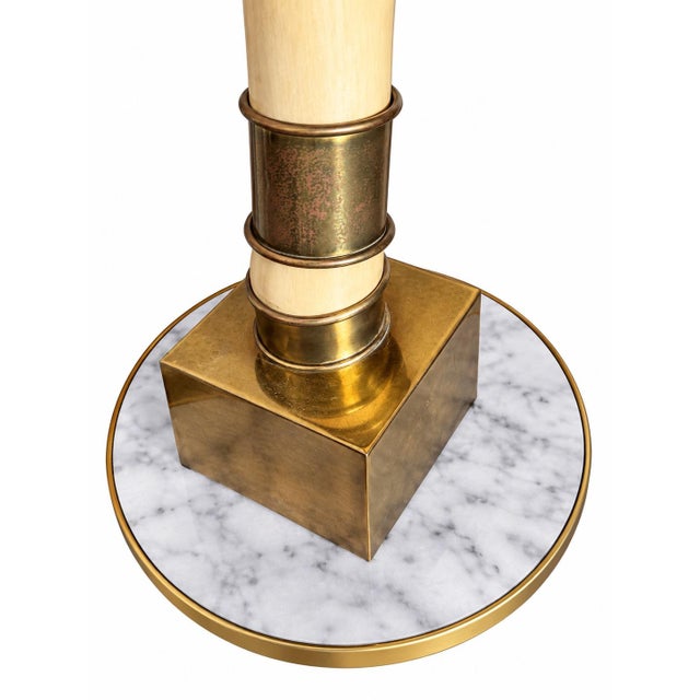 This vintage Hollywood Regency decorative sculpture features a single curved "tusk" form in a warm ivory tone, mounted in...