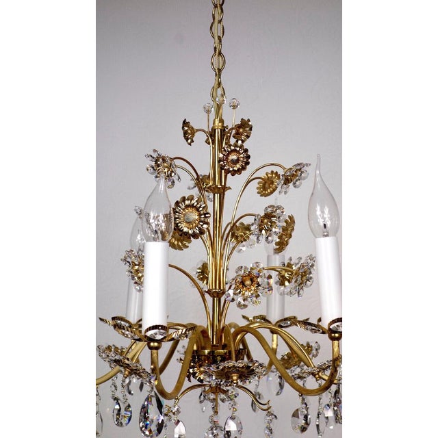 Beautiful chandelier, which has an impressive design off and throws very nice light even when the condition is switched on...