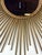 Vintage sunburst mirror by Chaty Vallauris, an iconic example of French design from the 1950s-1960s. This mirror features...