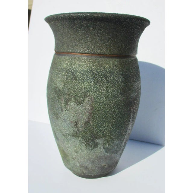 Rhonda Clearlock stoneware with copper studio vase. Studio vase with added copper wire at the neck area of the vase. The...