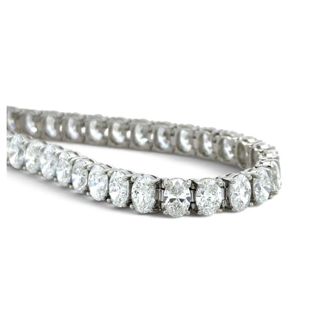 This stunning bracelet contains 37 oval brilliant cut diamonds weighing 20.56 carats total. Crafted in platinum, this...