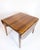 Dining table from the 1960s made of rosewood with beautiful and vibrant grain. The table has two oval folding sides, which...
