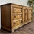 Vintage Mediterranean-style triple dresser with parquet herringbone drawer fronts and brass hardware. This nine-drawer...