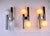 Very rare and stunning chrome wall lamp, created by the well known atelier Sciolari, is inspired by the Space Age...