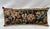 Pillow upholstered in an exquisite 18th-century tapestry featuring a charming floral motif against a rich brown ground....