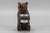 This beautiful hand-carved wooden seated bear is holding an aluminum pot. Nicely detailed, with glass eyes. Can be used...